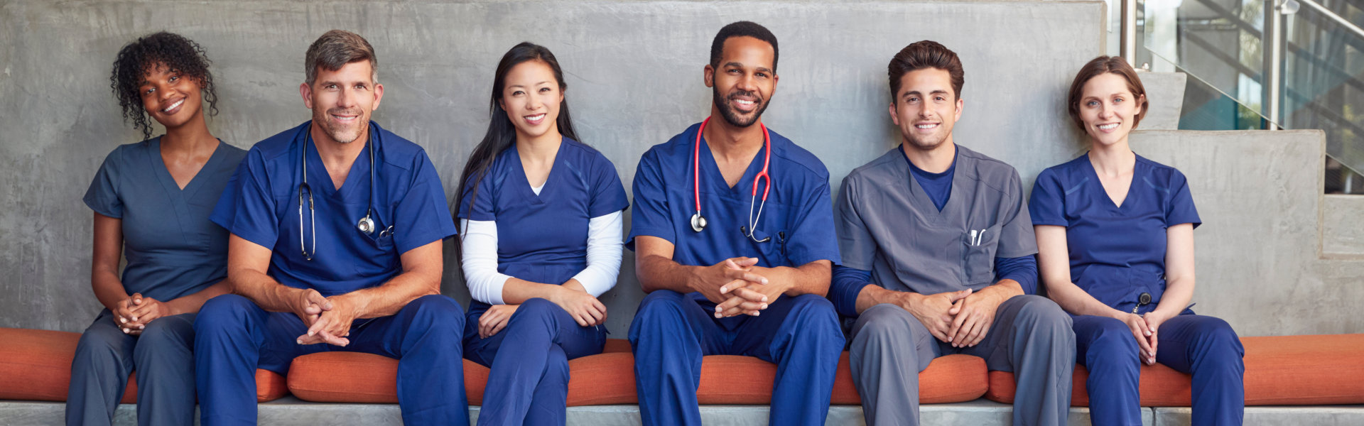 Nurses sitting while laughing